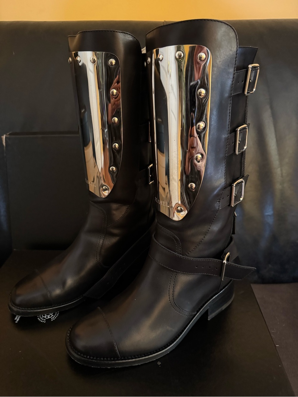 CHANEL Black Leather Knee-High Combat Boots with Silver Plate